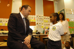 Governor Huckabee and a young student talk music
