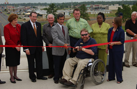 Huckabee participates in a highway ribbon cutting